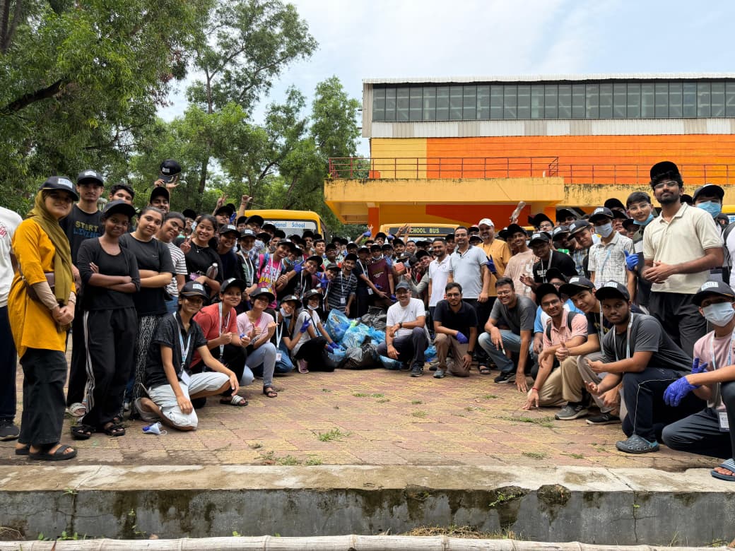 Kriti students leading by example during a cleanliness drive at Gymkhana, demonstrating teamwork, responsibility, and commitment to a cleaner campus.
