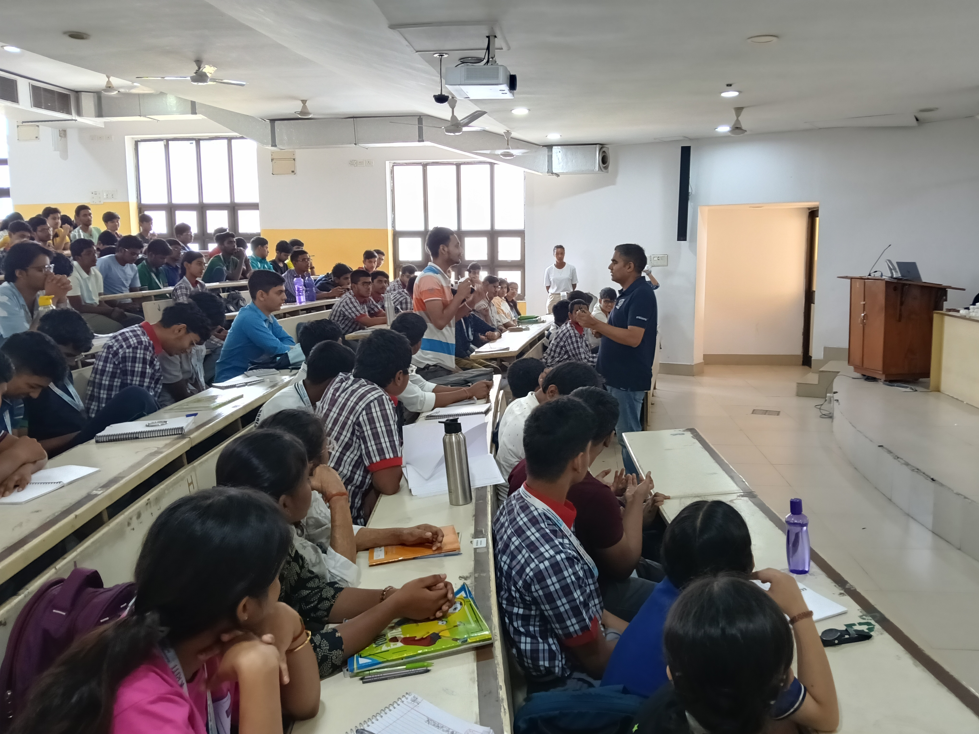Engaging discussions between students and faculty experts.
